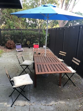 Porch table ($150), 4x wood chairs ($50 total) table umbrella ($20) 1
