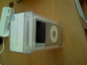 NEW 2nd Gen iPod Nano Silver 4GB - $130 2