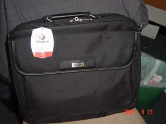 FS: Targus notebook case (NEW) and one backpack (used) 1