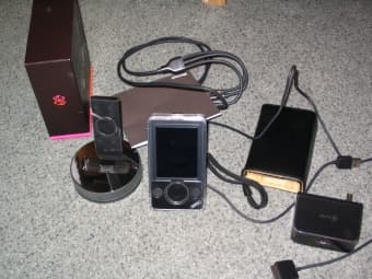 30GB Zune portable music player, 2 cases, docking station 1