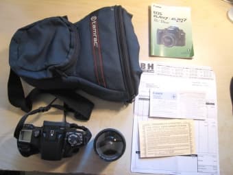 Canon Elan 7 SLR Camera + 28-90 Canon Ultrasonic Lens Under Warranty. 1