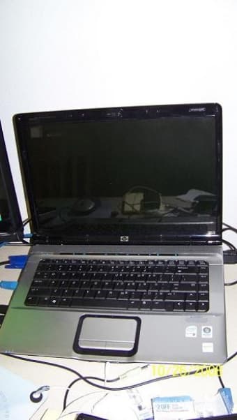 HP dv6000t laptop, Cuo 2 Duo 1.73GHZ, 160GB, 2GB, 12 cell Battery 1