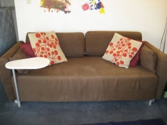 Ikea sofa bed with swivel table - $70 (stanford) 1