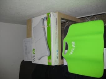Brand New Wii Fit $100 + Free Protective Sleeve 1