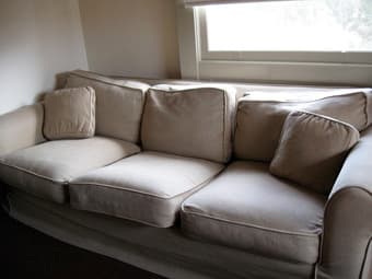 plain beige couch - really comfortable $60 obo 1