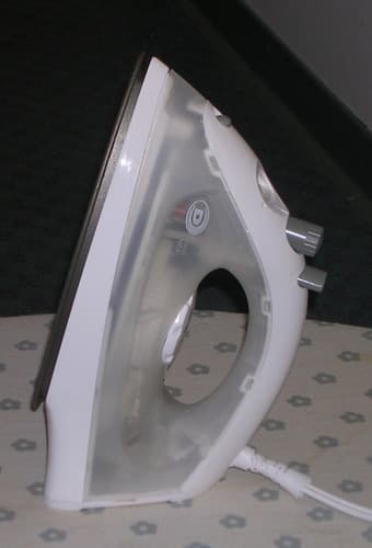 Brand new Iron and portable irining board - $12 2