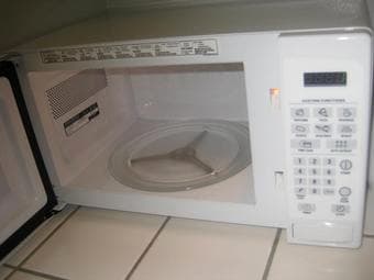 GE white microwave -- ($25 obo) 2