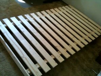 Asian-style wooden XL twin bed frame (free XL twin mattress): $80 1