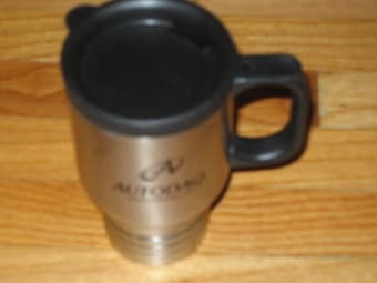 stainless-steel travel mug for sale $4 each 1