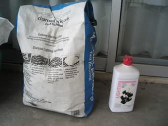 Half bag of charcoal and some lighter fluid 1