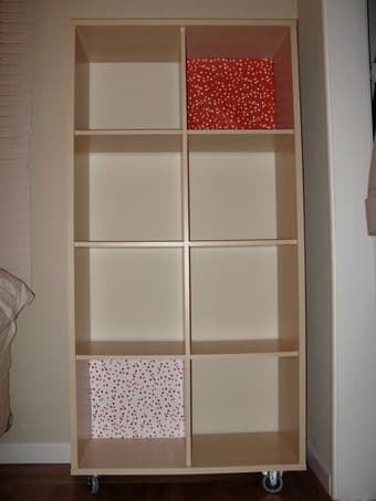 Bookshelf with rolls 1