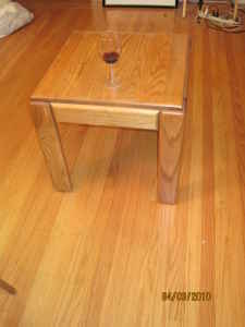 Small solid wood corner table - $30 2