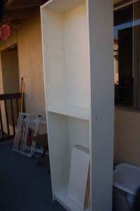 Tall white bookcase - 20$ 1