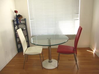Glass Dining Table and Genuine Leather Chairs 1