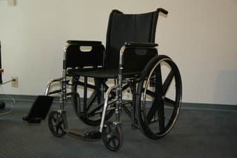 Foldable wheelchair with leg rest in great condition for sale 1