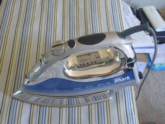Flatiron + Ironing Board for sale at 25$ 2