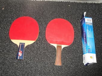 ping pong paddles & balls in package ($7) 1