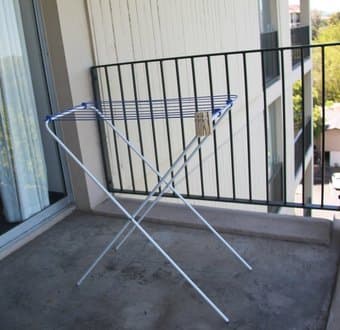 Moving sale!!! Candles, drying rack, cushions and Brita 1