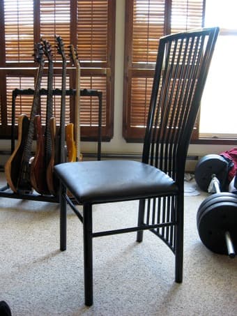 Four black lacquer/leather chairs dining chairs, $20 1