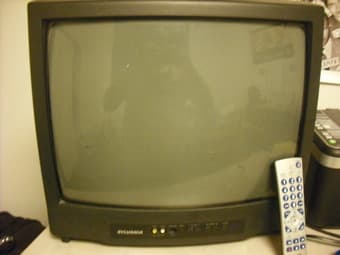 TV for sale $25.00 with universal remote 1