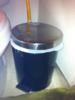 Step to open bathroom trashcan - $5 1