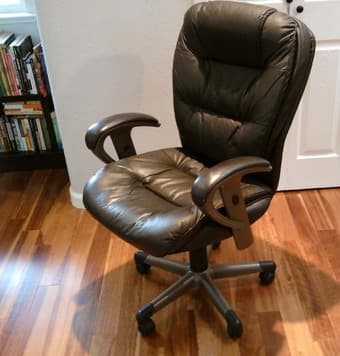 Office chair, dark brown "leatherette," $75 2