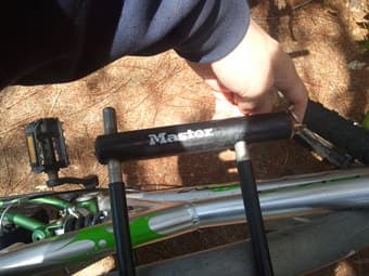 Triax adult mtn bike, silver/green, works fine, with lock $80 2