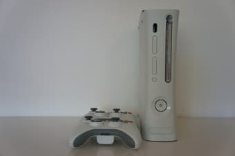 XBOX 360 including titles and guitar (for guitar hero) : $100 1