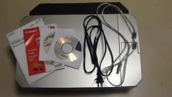 Canon Printer/Scanner/Copier + New black cartridge - $50 3