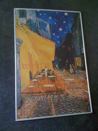 storage bins, framed Van Gogh poster, Breakfast at Tiffany's DVD 2
