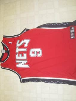 Signed Nets Jersey Yi Jianlian $75 2