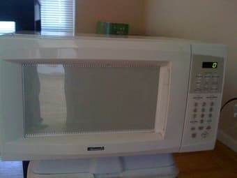 Office char, Ikea Chair, microwave, TV, DVD player, Bed 3