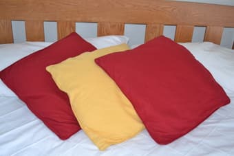 2 Red and 1 Yellow IKEA cushions and covers 2