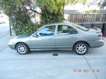 Low milesage 1999 Ford Coutour (Grey, 44k) 1