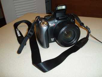 Canon Powershot SX10IS 10MP Digital Camera with 20x Wide Angle 2