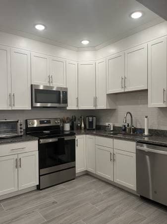 Back Bay. Newly Renovated, Front Facing Marlborough St. between E & F. 3