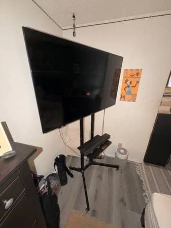 Heavy-Duty Rolling TV Stand / Mobile TV Cart – Large TVs 1