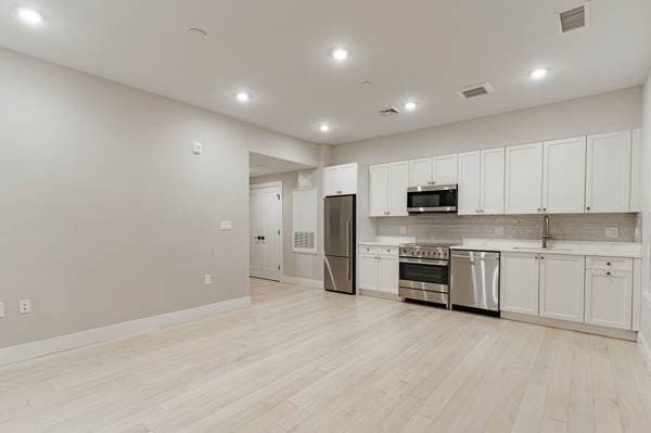 Modern JP Studio w/ In Unit Laundry + Central AC - Students OK 2