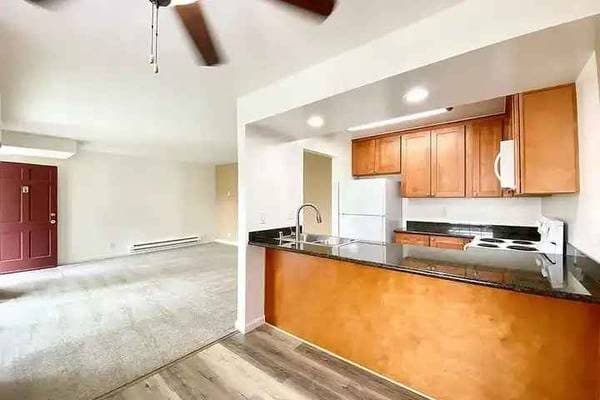Quiet Unit Loaded with Sun & Great Storage Space 1