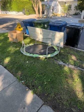 FREE TRAMPOLINE GOOD CONDITION AND FREE DOOR 1