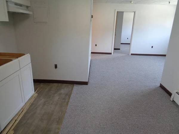3 rooms + bath, Remodeled Kitch, Berber carpeting, Hw & Park INCL 1