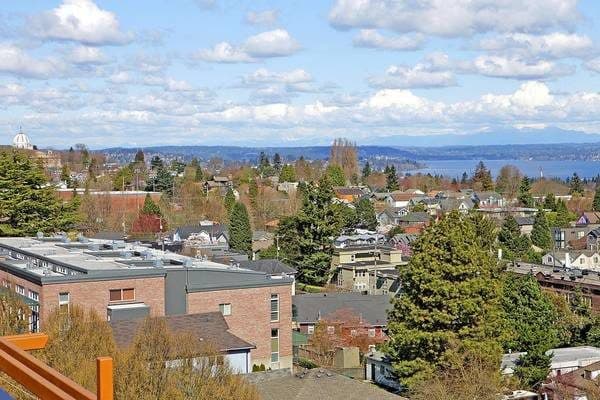 Rooftop Amenity Space With Views of the Cascades and Mt. Rainier! 1