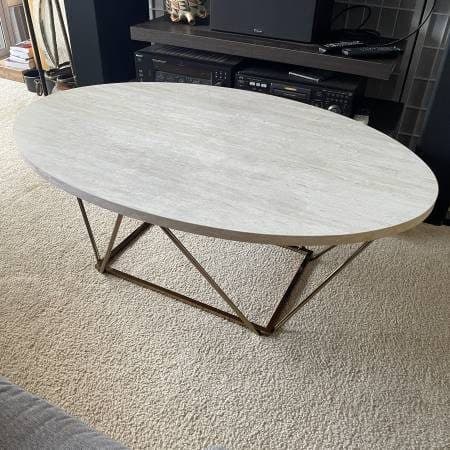 Modern Oval Coffee Table with Geometric Gold Base 1