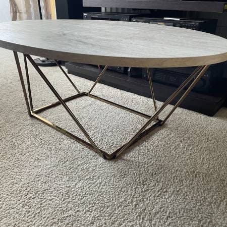 Modern Oval Coffee Table with Geometric Gold Base 2