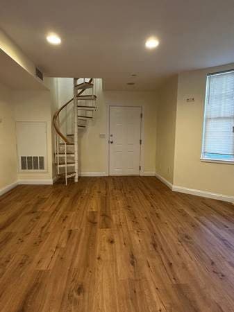 Entire 1st floor in two-story 3BD/2BR, 12 month lease 1
