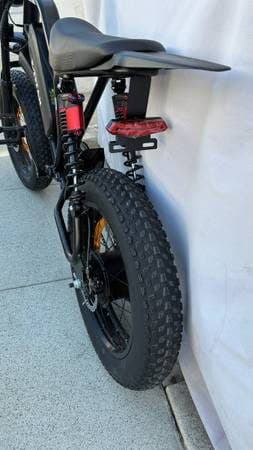 A05 electric bike with fat tires and suspension.     Seat Too low for me🤬. 2
