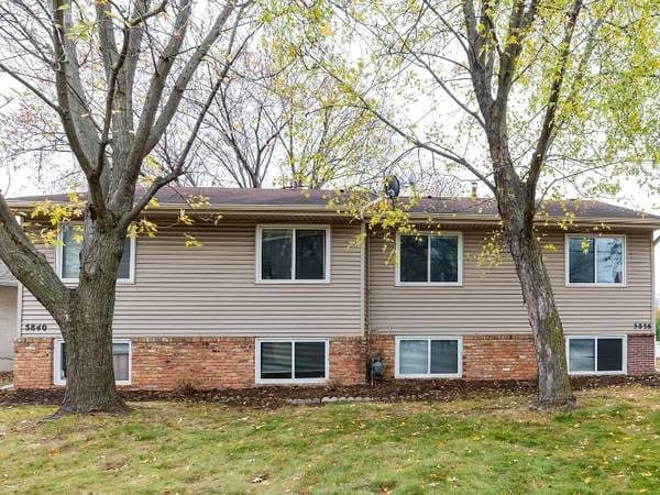 Spacious 4BR/2BA Townhome with Two Living Areas & Garage Parking 2