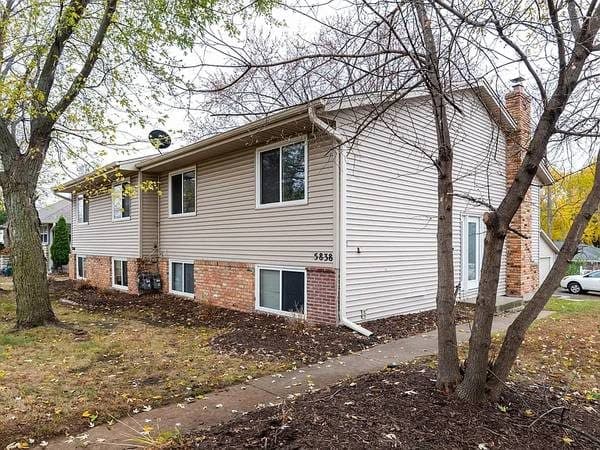 Spacious 4BR/2BA Townhome with Two Living Areas & Garage Parking 1